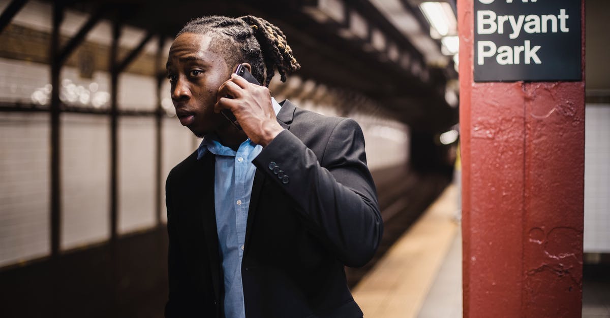 182 hours for a radio station to call in settlers? - African American male in formal wear talking on mobile phone and looking into subway tunnel with worried expression on face while waiting for train at empty New York metro station 182 hours for a radio station to call in settlers? - African American male in formal wear talking on mobile phone and looking into subway tunnel with worried expression on face while waiting for train at empty New York metro station
