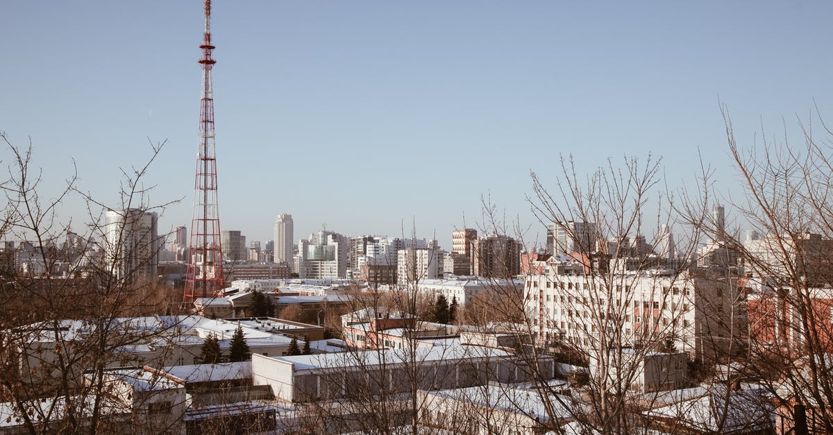 182 hours for a radio station to call in settlers? - Modern buildings and transmission tower in city 182 hours for a radio station to call in settlers? - Modern buildings and transmission tower in city