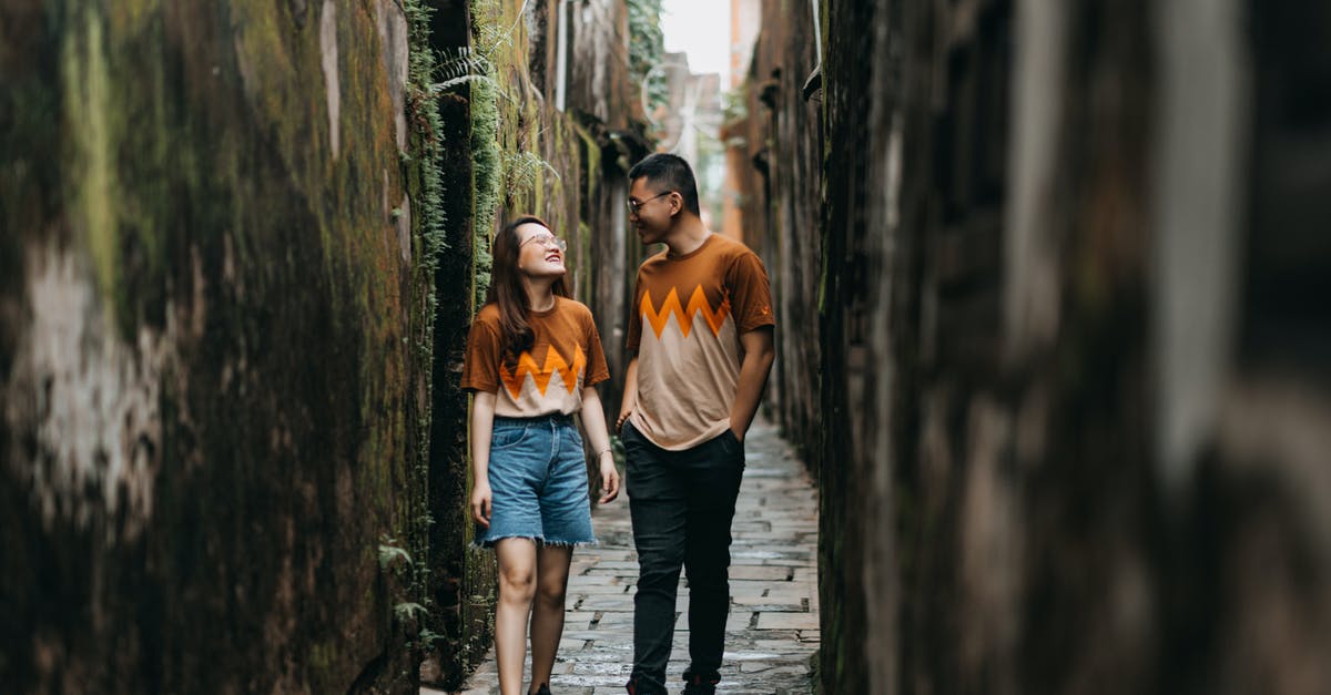 'affected by Lycanthrophy' (BMC) is functionally the same as 'appear as wolfpack to Seer'? - Ethnic couple walking on narrow city street 'affected by Lycanthrophy' (BMC) is functionally the same as 'appear as wolfpack to Seer'? - Ethnic couple walking on narrow city street