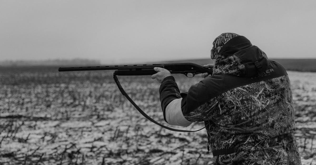 .50 Cal Hunting Rifle doing WAY more damage than other guns? - Grayscale Photo of Person Holding Rifle .50 Cal Hunting Rifle doing WAY more damage than other guns? - Grayscale Photo of Person Holding Rifle