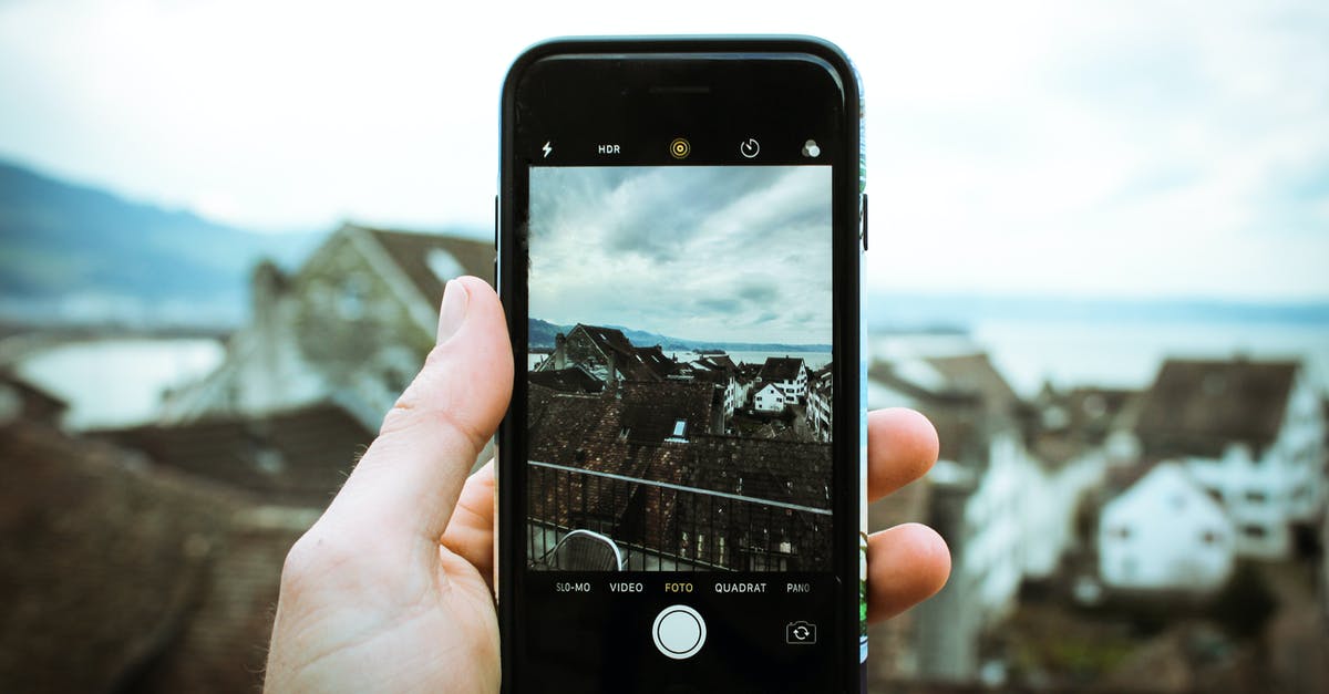 7 days after mobile authentication, still getting 15 day hold. - Person Holding Black Smartphone Taking a Picture of Brown House at Daytime 7 days after mobile authentication, still getting 15 day hold. - Person Holding Black Smartphone Taking a Picture of Brown House at Daytime