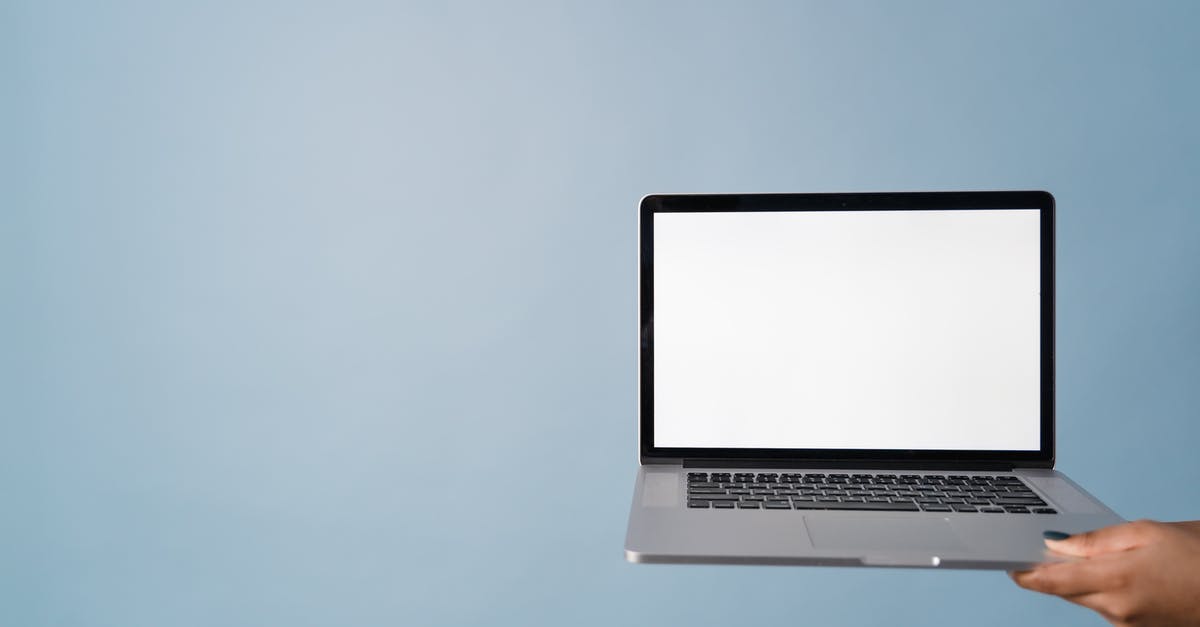 A Minecraft PE mod is asking me if my device is 'rooted'. What does this mean? [closed] - Close-Up Shot of a Person Holding a Laptop