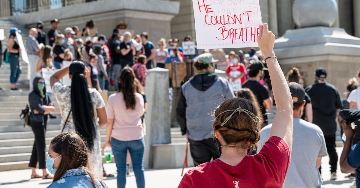 A vassal gained a title and he became independent - Woman Holding a Card with the Word Sexism