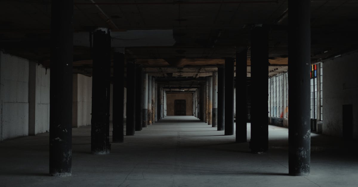 Abandon Clan Hall Quest - Perspective view of dark empty large hall of old building with columns and sunbeams coming in
