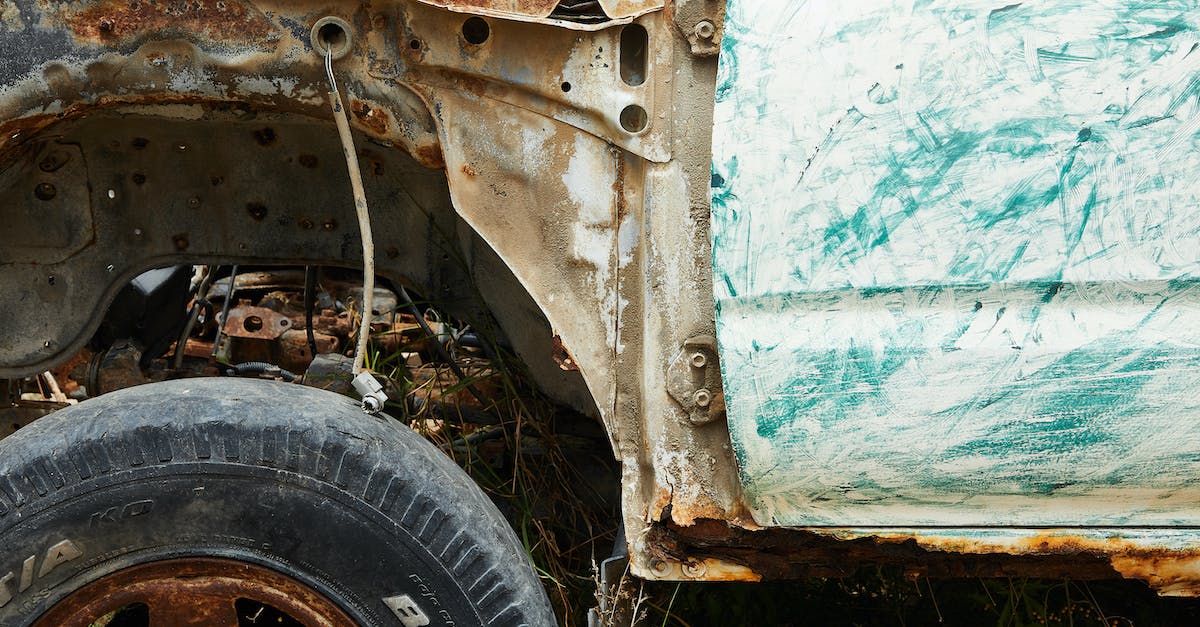 Accessing biome-specific grass tints w/out use of external programs? - Aged metal rusty damaged car on grass