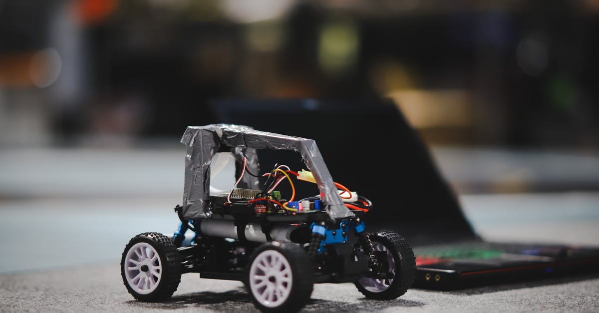 AE2 Inscriber auto crafting is not importing the final product into the computer - Skeleton model of machine with electrical wires near laptop