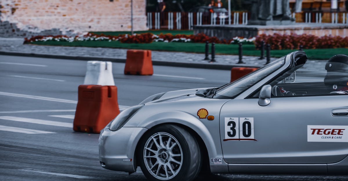 After completing a blacklist race is there a way to guarantee a pink slip reward from the opposing driver? - Crop anonymous person in protective helmet driving modern sports car on asphalt road in city in daytime After completing a blacklist race is there a way to guarantee a pink slip reward from the opposing driver? - Crop anonymous person in protective helmet driving modern sports car on asphalt road in city in daytime