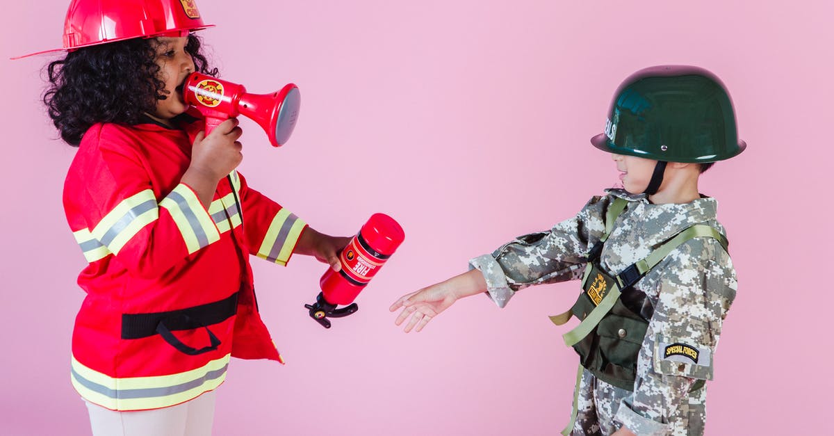After the game starts, does healing a hero that damaged themself charge Mercy's ultimate? - Side view of multiracial children in military uniform and fireman costume with megaphone and fire extinguisher standing together on pink background in helmets