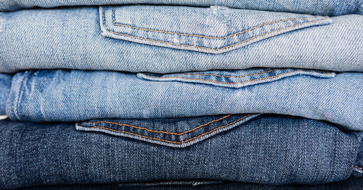 After trading pokémon, what is the range of new IVs? - Closeup of stack of blue denim pants neatly arranged according to color from lightest to darkest