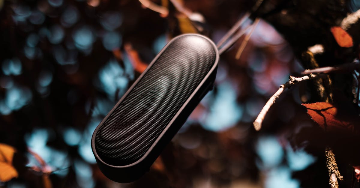 Age of Empires II - Music and dialog sound OK but no sound effect - Modern portable speaker on glass surface on blurred background