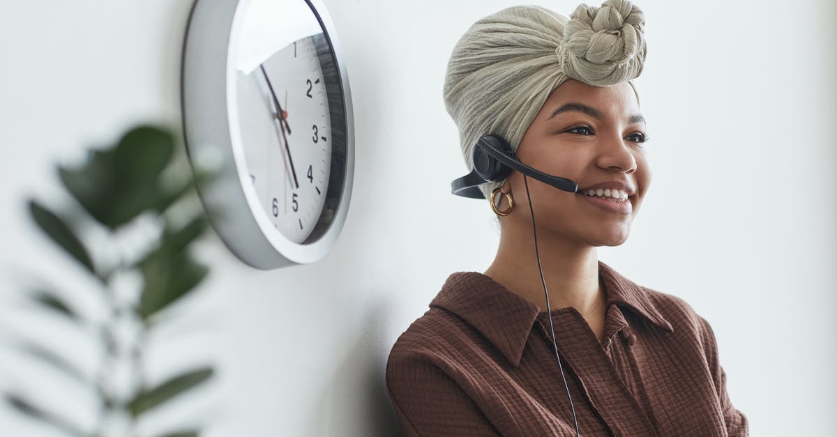 Agent A: Lightbulb and a Hammer - Cheerful black operator with headset sitting at wall