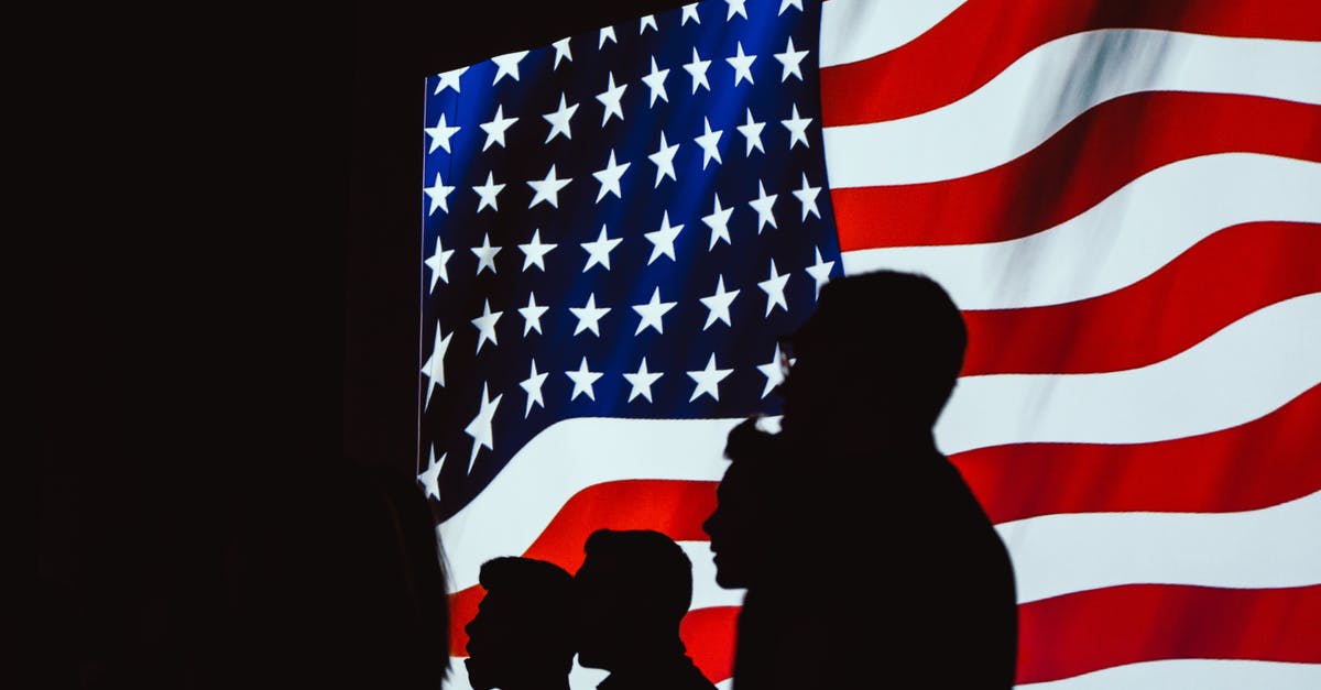 AI guarantees independence of nations after taking their territory - Silhouette of People Beside Usa Flag AI guarantees independence of nations after taking their territory - Silhouette of People Beside Usa Flag