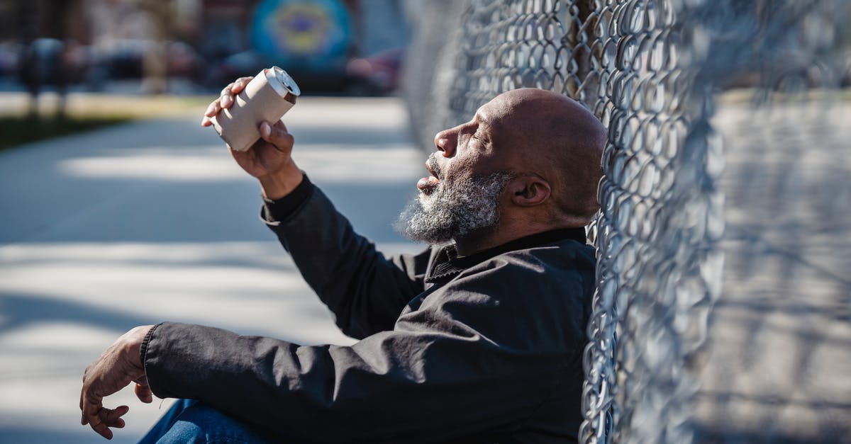 All my nuggets are depressed, what can I do? - Man in Black Jacket and Blue Denim Jeans Sitting on Ground
