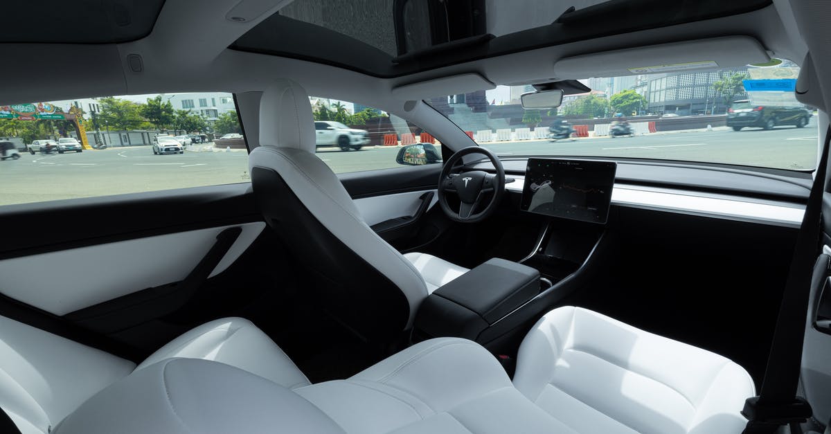 Am I missing something with Winston's Tesla Cannon? - Black and White Car Interior