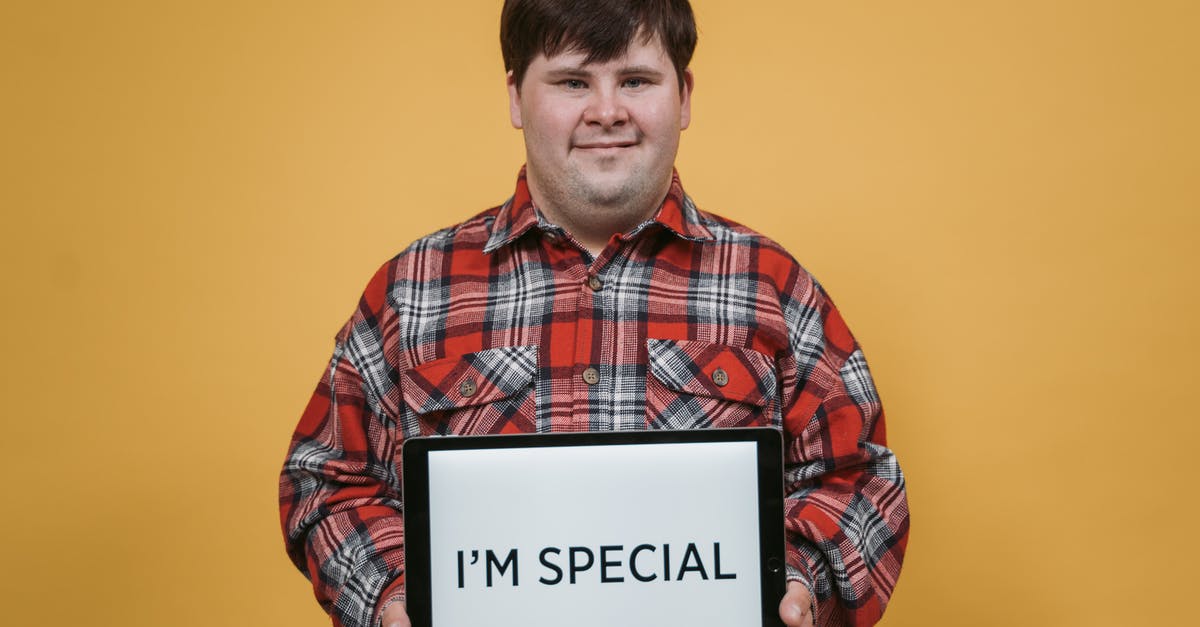 Am I poisoned forever? - Man Holding an Ipad with a Message on a Yellow Background Am I poisoned forever? - Man Holding an Ipad with a Message on a Yellow Background