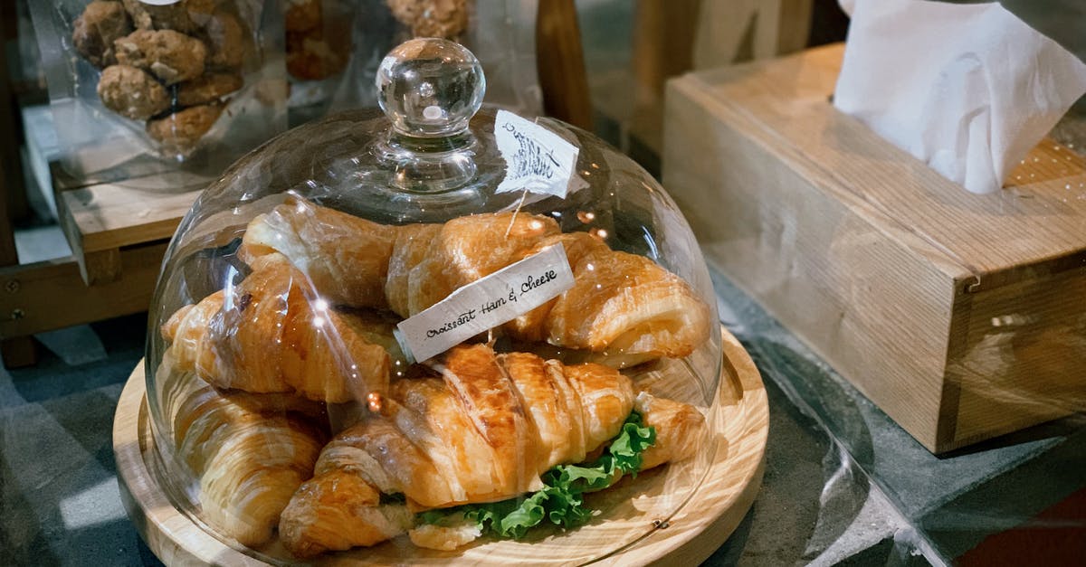 Am I required to pull off crazy Golden Cookie combos? - Delicious croissants and cookies near tissue box in bakery