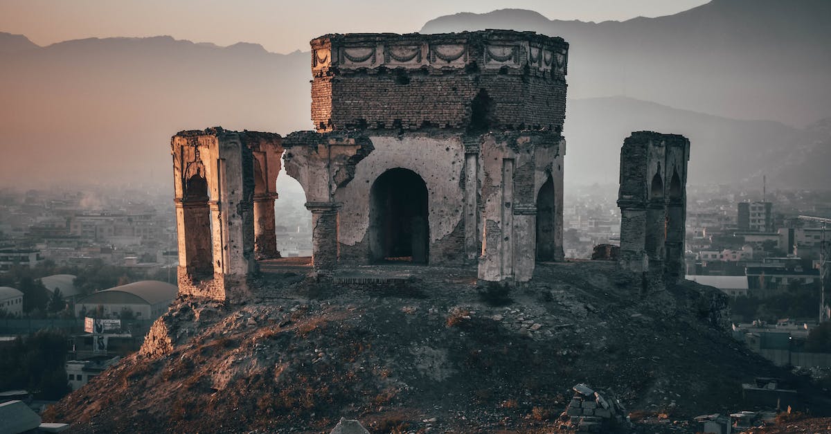 An unbeatable fortress of a singe vampire? - Gray Concrete Building on Top of Hill