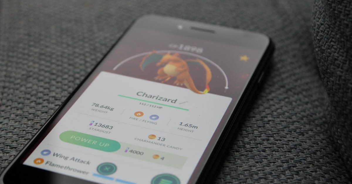 Android Pokemon go - General vs miscellaneous notifications? - Turned-on Iphone Displaying Pokemon Go Charizard Application