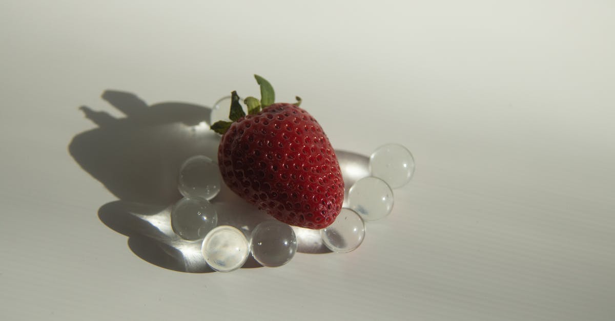 Any benefit in using Razz Berry and Great Ball at same time? Any harm? - Sweet strawberry placed on small glass balls Any benefit in using Razz Berry and Great Ball at same time? Any harm? - Sweet strawberry placed on small glass balls