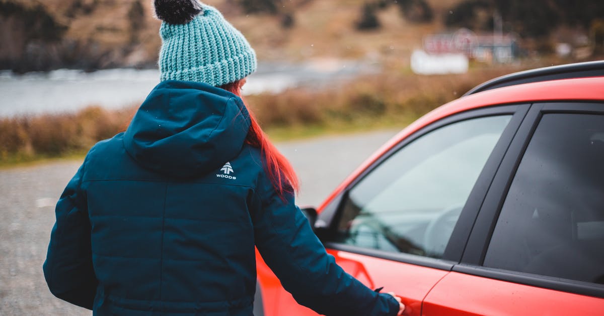 Any door villager can't open - Young woman opening door of red car