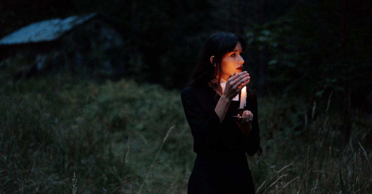 Any tips for beating Malthael as a Wizard on high difficulty levels? - Woman in Black Dress holding a Lighted Candle 