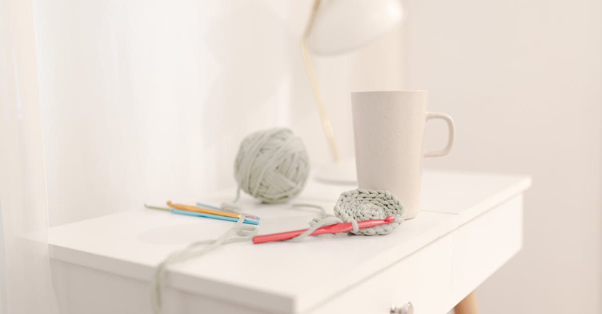 Any way to hook up an item sorter to expandable storage? - Knitting hook with knitted detail composed with threads
