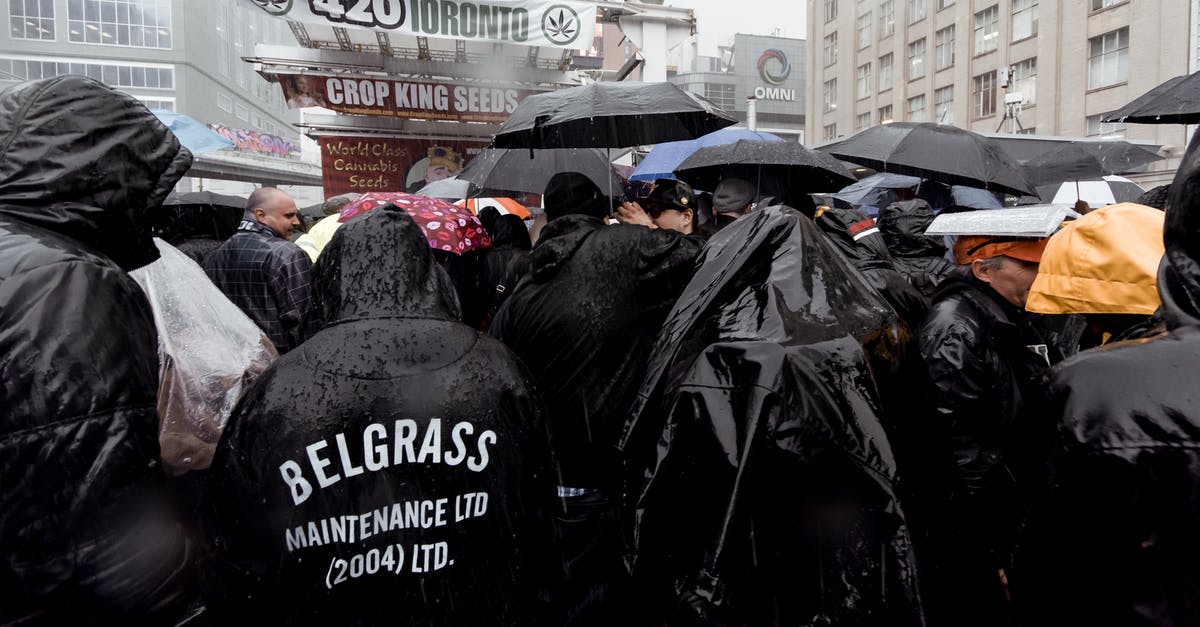 Any way to mass delete people? - Unrecognizable people standing in raincoats on street Any way to mass delete people? - Unrecognizable people standing in raincoats on street