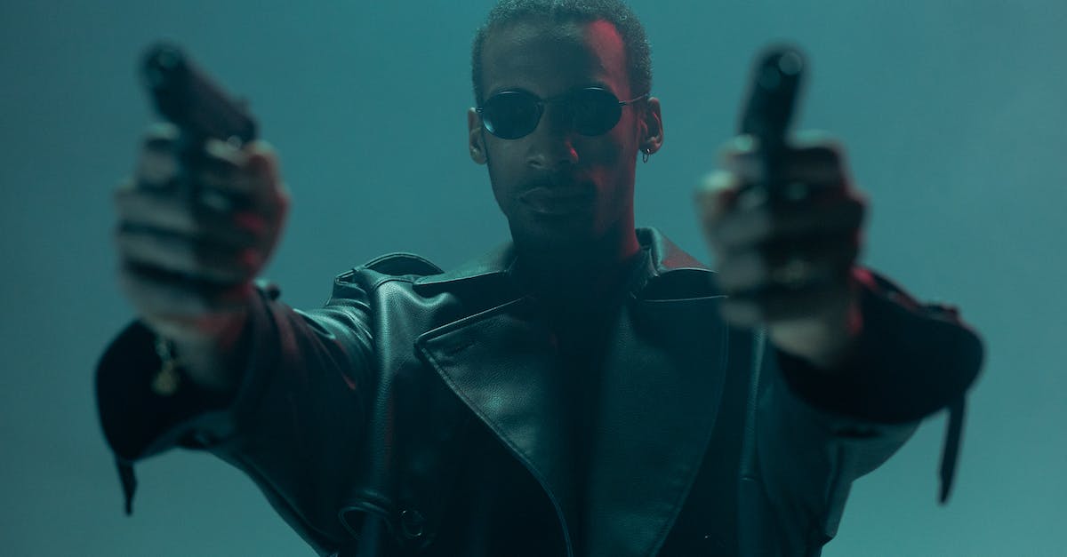 Are all bot killer weapons strange? - A Man in in Leather Coat Holding Handguns Are all bot killer weapons strange? - A Man in in Leather Coat Holding Handguns