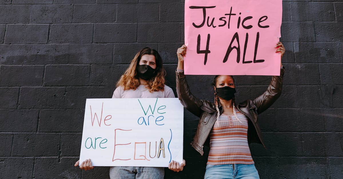 Are all bots created equal? - A Man and Woman Wearing Face Mask Holding Banners Are all bots created equal? - A Man and Woman Wearing Face Mask Holding Banners