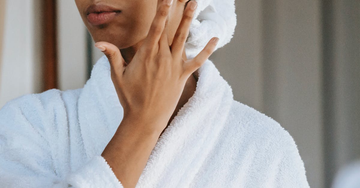 Are altars able to spread crimson/corruption? - Crop anonymous female in white bathrobe with towel on head applying facial moisturizing cream on face while standing in bathroom Are altars able to spread crimson/corruption? - Crop anonymous female in white bathrobe with towel on head applying facial moisturizing cream on face while standing in bathroom