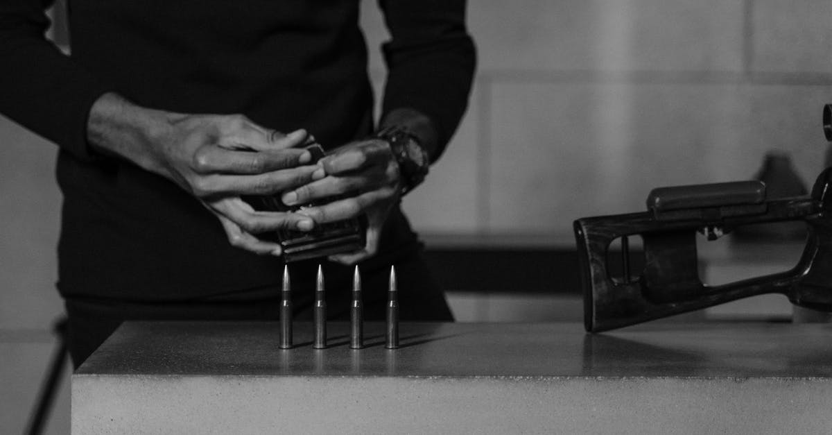 Are certain weapons considered two-handed? - Grayscale Photo of Bullets on Concrete Surface Are certain weapons considered two-handed? - Grayscale Photo of Bullets on Concrete Surface