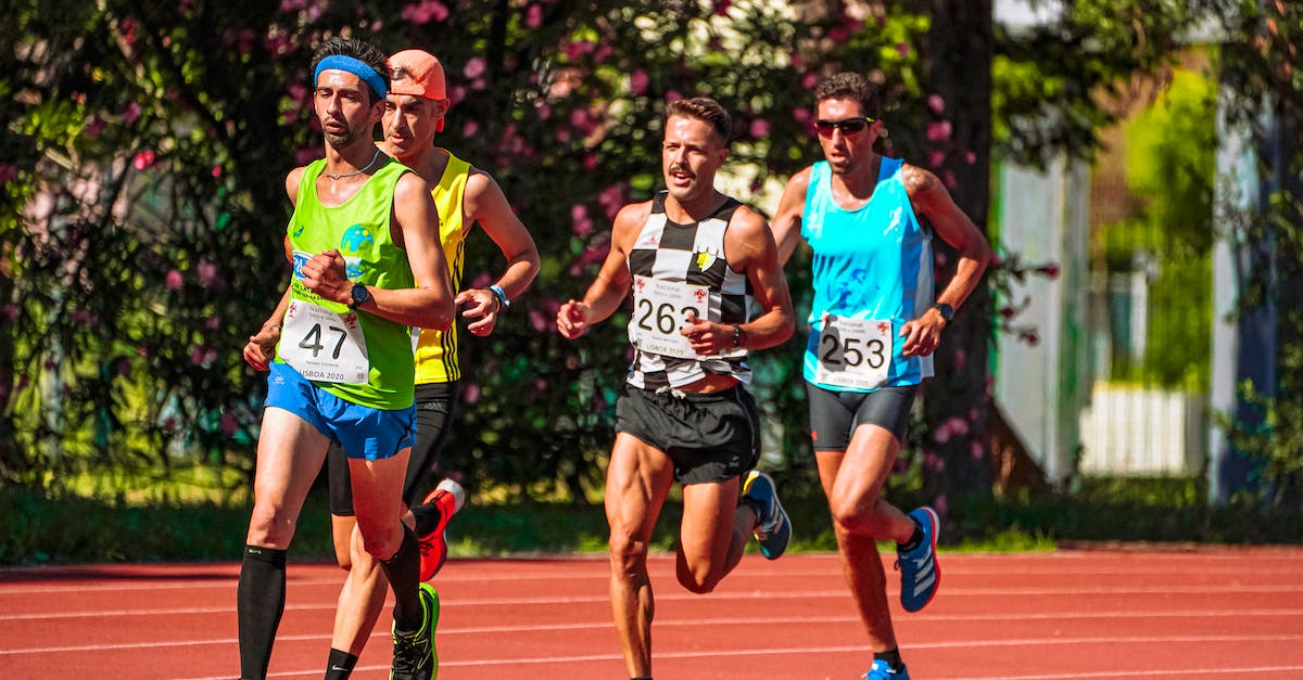 Are characters unlocked by number of individual track races completed? - Group of young focused sportsmen in bright active wear running during track and field competition Are characters unlocked by number of individual track races completed? - Group of young focused sportsmen in bright active wear running during track and field competition