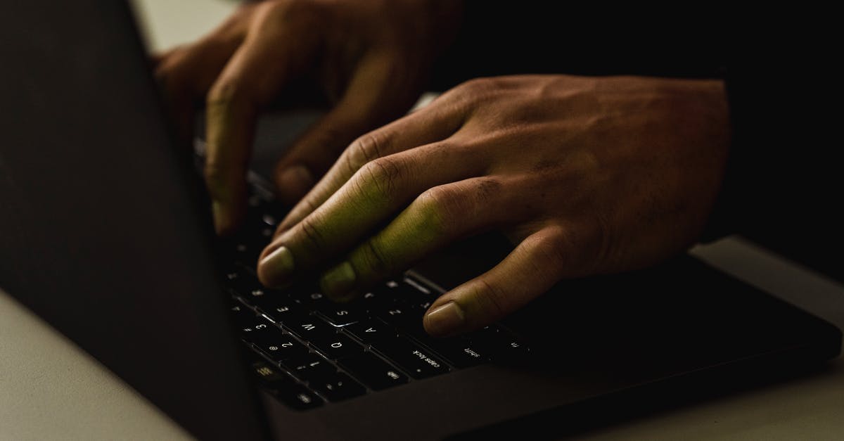 Are developer messages useful? - Crop unrecognizable person typing on laptop keyboard