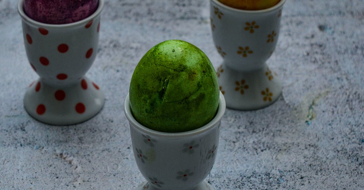 Are eggs sorted in specific order and what determines it? - Painted Eggs on Egg Cups with Design Are eggs sorted in specific order and what determines it? - Painted Eggs on Egg Cups with Design