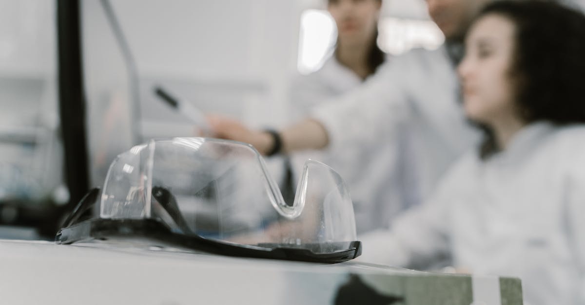 Are enchantments beyond Protection 10 effective? - Man in White Dress Shirt Holding Black Framed Eyeglasses