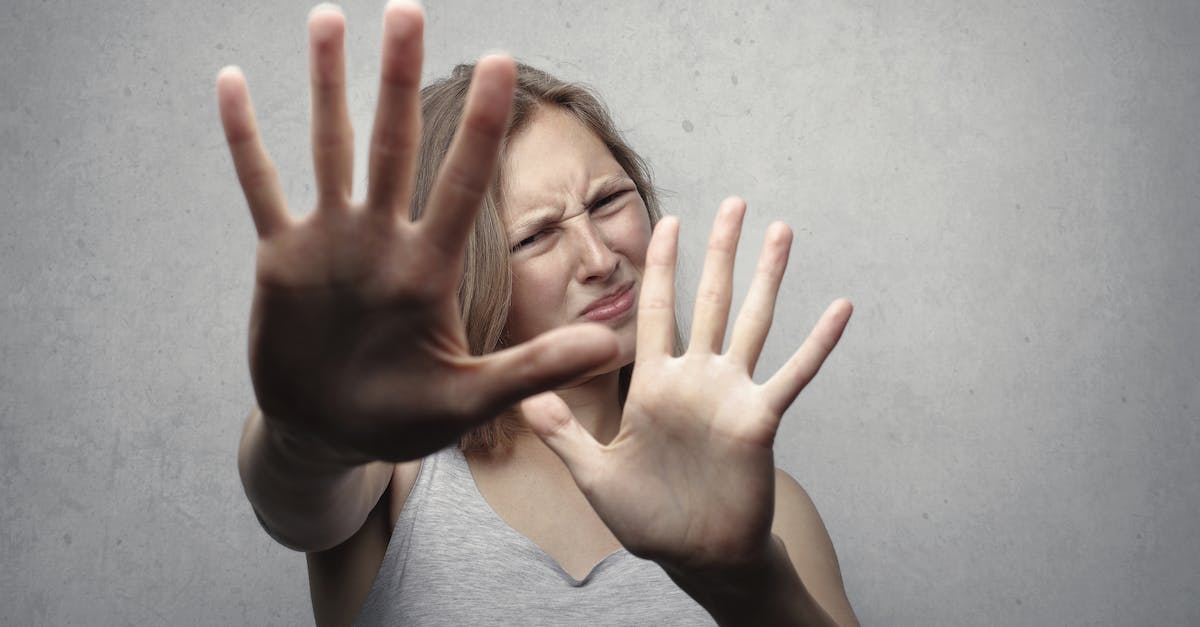 Are Endermen afraid of certain enchantments? - Woman in Gray Tank Top Looking Frightened