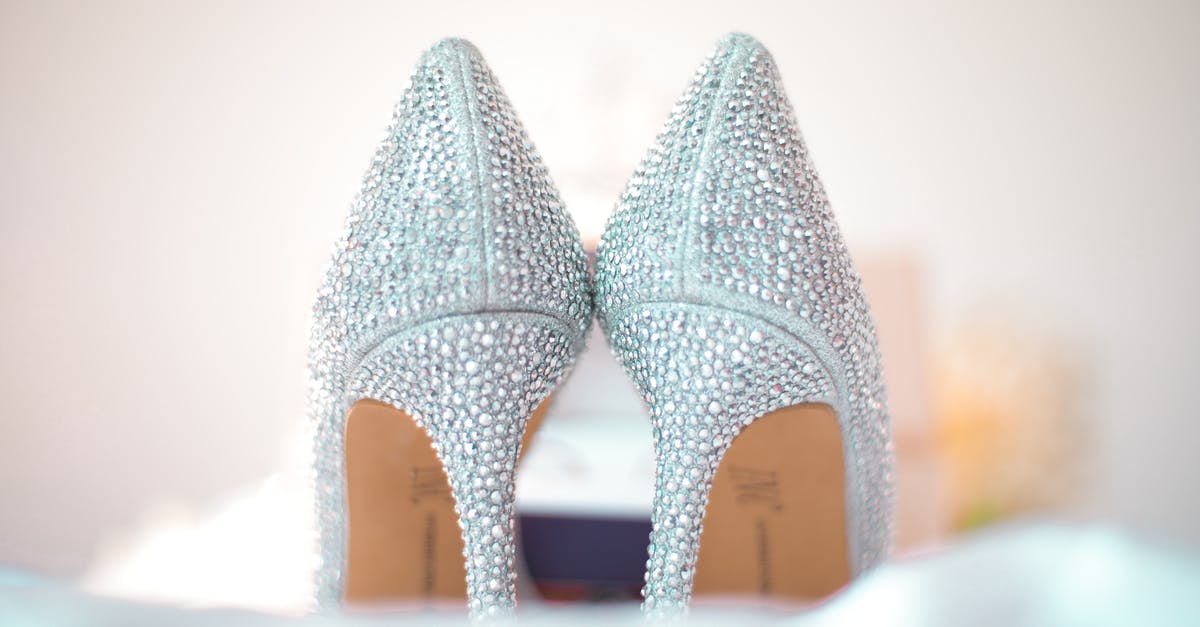 Are event accessory items unique, or can we use 2 of the same accessory? - Stylish wedding high heels decorated with shiny silver rhinestones placed on white fabric Are event accessory items unique, or can we use 2 of the same accessory? - Stylish wedding high heels decorated with shiny silver rhinestones placed on white fabric