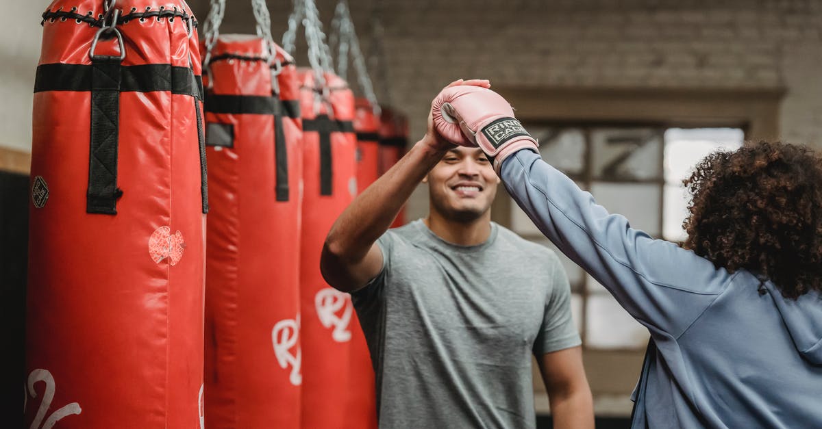 Are Halo MCC Achievements based on personal performance? - Positive ethnic male coach having high five with female after boxing training in gym with punching bags Are Halo MCC Achievements based on personal performance? - Positive ethnic male coach having high five with female after boxing training in gym with punching bags