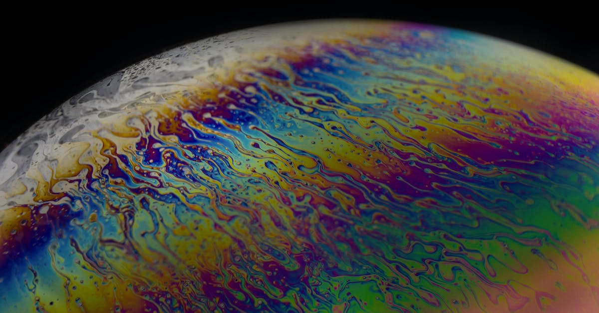 Are heal on hit also applied on dot effects? - Macro shot of abstract rainbow and white colored round bubble with spots and swirls on black background Are heal on hit also applied on dot effects? - Macro shot of abstract rainbow and white colored round bubble with spots and swirls on black background
