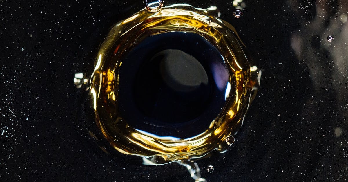 Are heal on hit also applied on dot effects? - Closeup of droplet hitting surface of dark liquid and creating round shaped swirl and splashes as background Are heal on hit also applied on dot effects? - Closeup of droplet hitting surface of dark liquid and creating round shaped swirl and splashes as background
