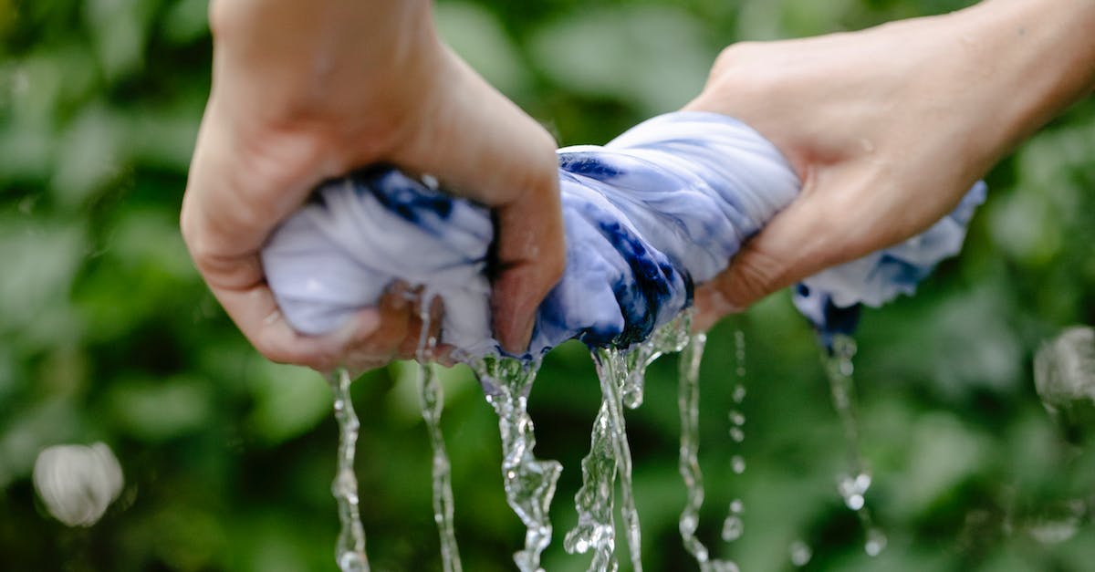 Are Legendary Crafting Materials able to drop from Rifts or other areas? - Crop person squeezing colorful textile