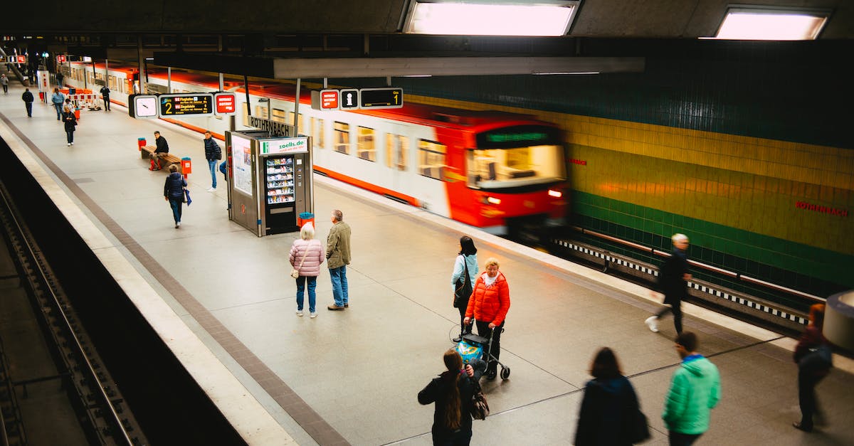 Are Metro: Last Light and Metro: 2033 the same game, with updated graphics? - People Walking on Train Station