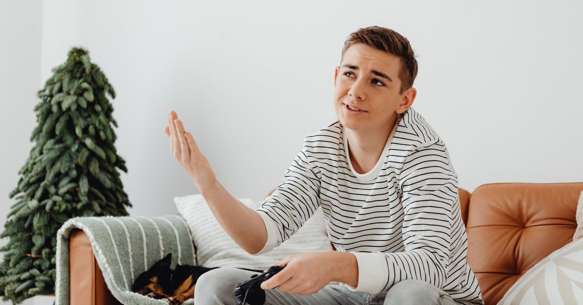 Are Minecraft console edition maps bugged in TU 31? - Man Sitting on Sofa Playing Video Game Are Minecraft console edition maps bugged in TU 31? - Man Sitting on Sofa Playing Video Game