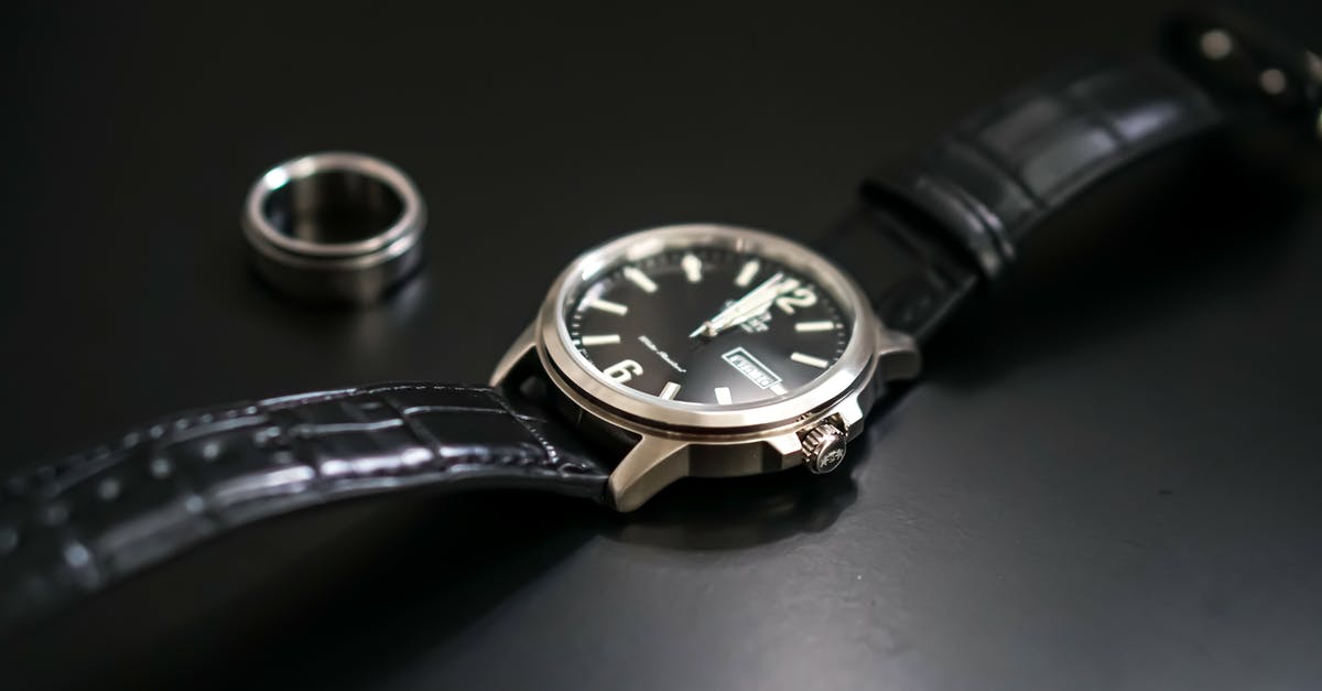 Are modern Ms. Pac-Man cabinets distributed with the &ldquo;fast/speed/speed-up&rdquo; setting/hack/mod turned on by default? - Classy wristwatch near ring for men on black background