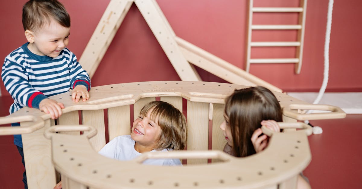 Are my friends immune to the harmful effects of radiation? - Girl in White and Blue Stripe Shirt Lying on Bed
