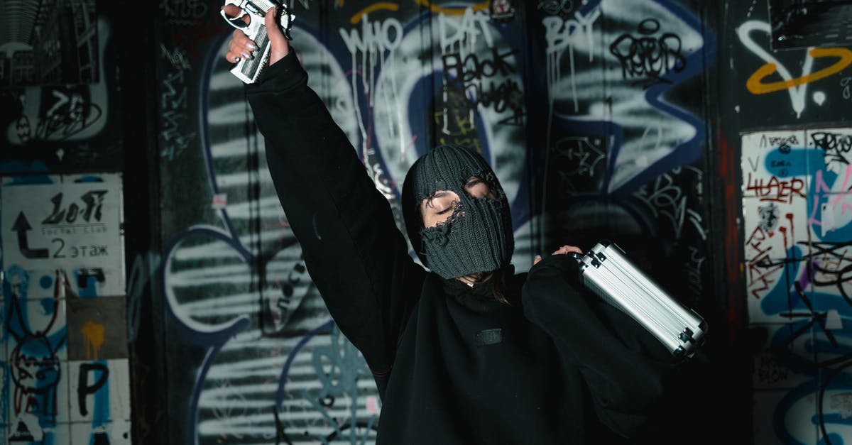 Are perk modifiers to weapon damage added before or after DT is applied? - Man in Black Hoodie Holding White and Black Gun Are perk modifiers to weapon damage added before or after DT is applied? - Man in Black Hoodie Holding White and Black Gun