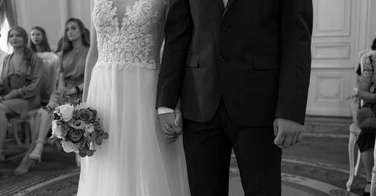 Are same-sex marriages allowed? - Grayscale Photo of Man and Woman Holding Hands