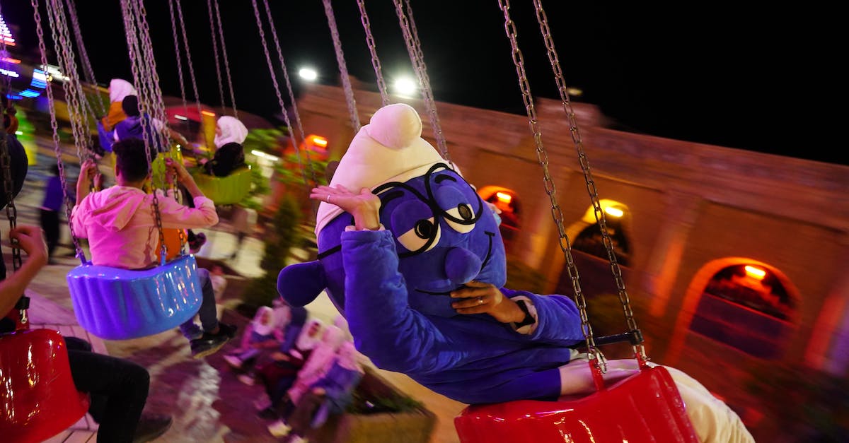Are smurf accounts allowed in Smite - Smurf Mascot and People Sitting on an Amusement Ride