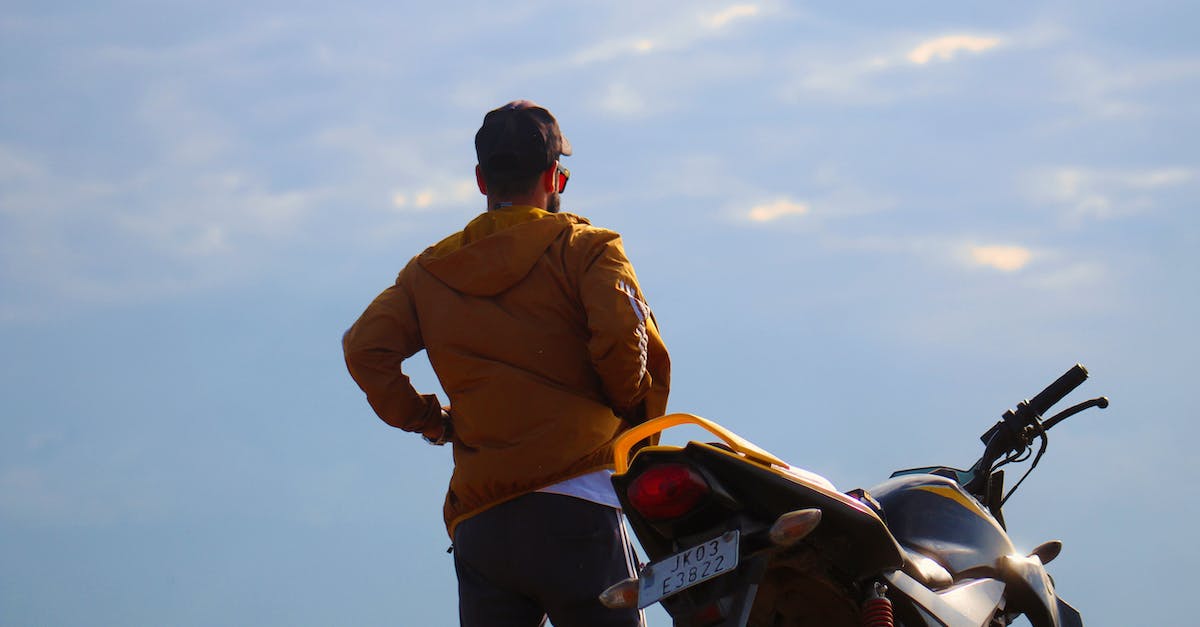 Are some DE:HR keycodes unobtainable? - Man in Brown Jacket Standing Beside Motorcycle