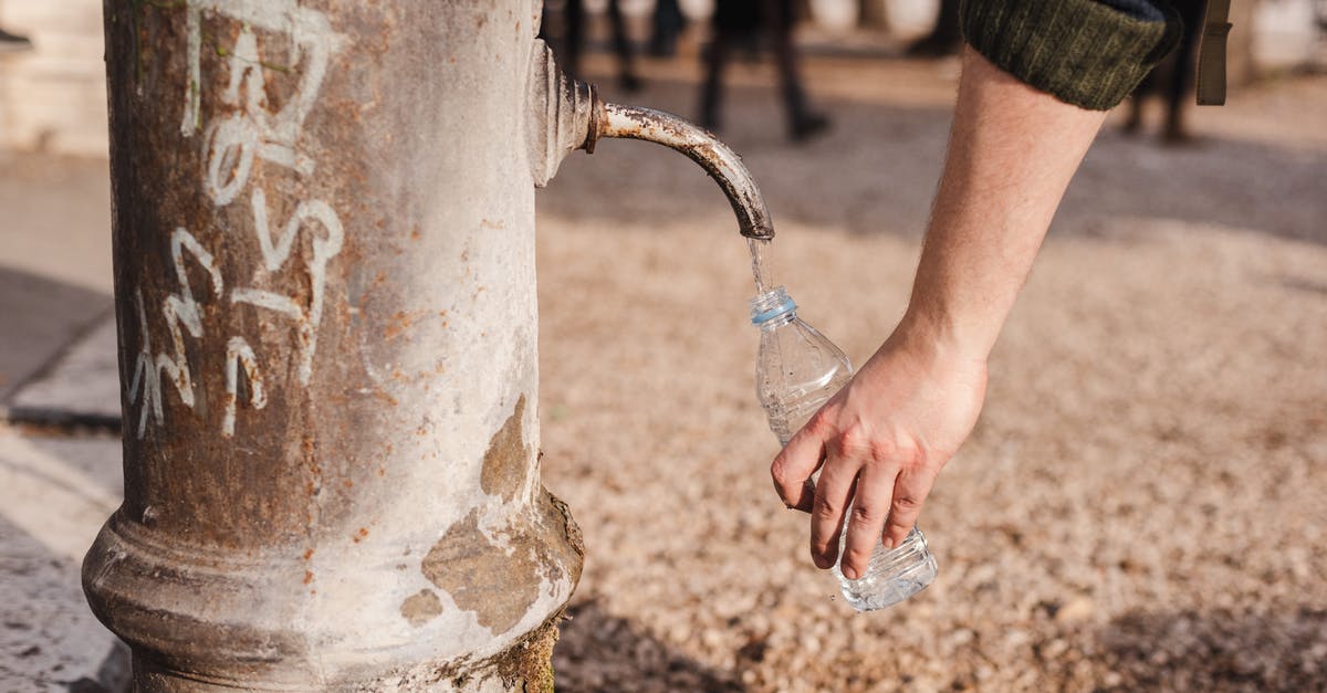 Are synths human for the purpose of damage calculation? - Crop person filling bottle with water from drinking fountain Are synths human for the purpose of damage calculation? - Crop person filling bottle with water from drinking fountain